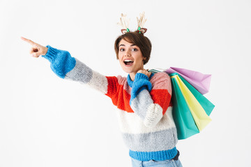 Wall Mural - Happy cheerful girl wearing sweater standing