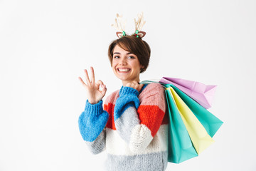 Wall Mural - Happy cheerful girl wearing sweater standing