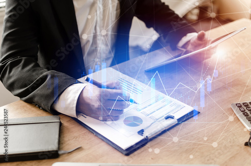 Accountant Investor Analysis On Financial Reports And Using Mobile - 