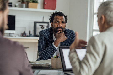 Wall Mural - Multiethnic Group of Businesspeople on a Meeting