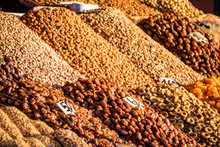 A Typical Market Stall Selling Nuts, Dried Fruits And Dates To Tourists In Marrakech