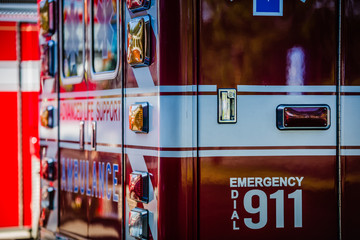 Wall Mural - Ambulance standing by at the fire station waiting for a call