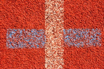 Wall Mural - Red running track Synthetic rubber on the athletic stadium.