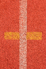 Wall Mural - Red running track Synthetic rubber on the athletic stadium.