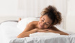 © Prostock-studio - African-american woman in spa salon, waiting for massage