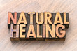 natural healing word abstract in wood type