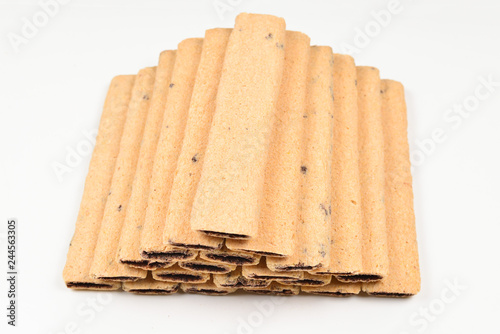 Fotografía Waffle bar with jam isolated on white. Pyramid of waffers.