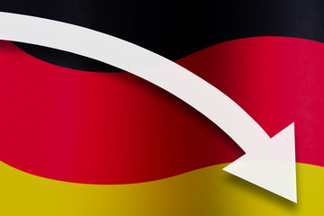 White arrow down on the background of the Germany flag