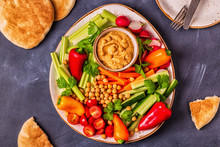 Hummus With Various Fresh Raw Vegetables.