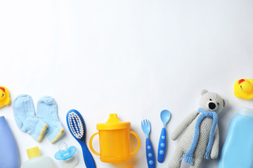 Wall Mural - flat lay composition with baby accessories and space for text on white background