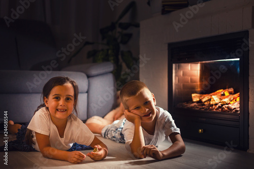Lying In Front Of Fireplace