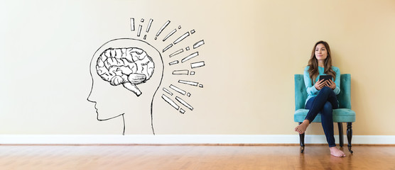 Wall Mural - Brain illustration with young woman holding a tablet computer