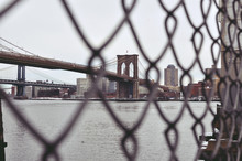 Brooklyn Bridge Behind Fence