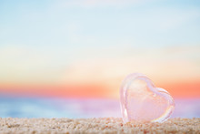 Clear Heart Sea Glass  On  Beach Sand