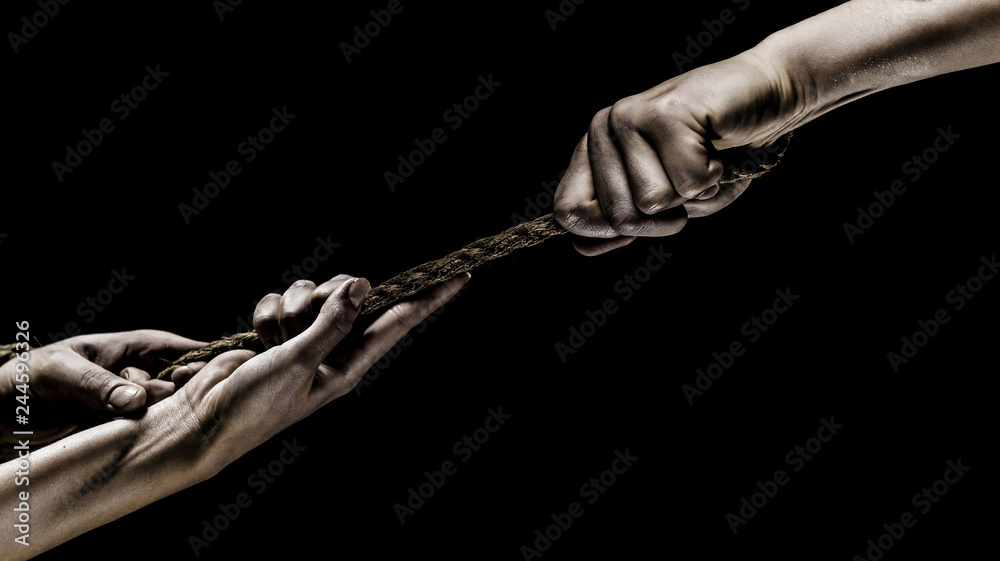 Hand holding a rope, climbing rope, strength and determination. Rescue ...
