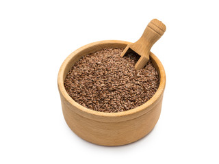 Wall Mural - Linseeds or flax seeds in a wooden bowl with a scoop isolated on white background