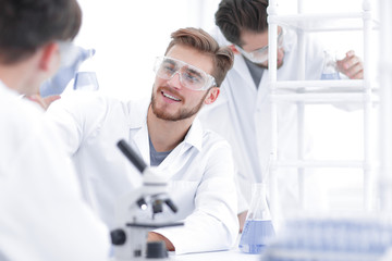 Wall Mural - closeup.smiling team of biologists in the lab