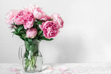 Beautiful Bouquet Of Pink Peony Flowers In Vase. Womans Day Or Wedding Background With Copy Space