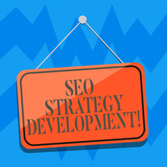 Text sign showing Seo Strategy Development. Conceptual photo Process of organizing a website s is content Blank Hanging Color Door Window Signage with Reflection String and Tack