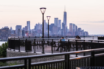 Fototapete - New York City midtown Manhattan sunset skyline panorama view from Boulevard East Old Glory Park over Hudson River.