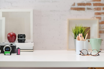 Working space of creative designer and copy space on white desk