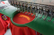 Embroidery machine needle in Textile Industry at Garment Manufacturers, Embroidery T-shirt in progress, Needle with thread (selective focus and soft focus)