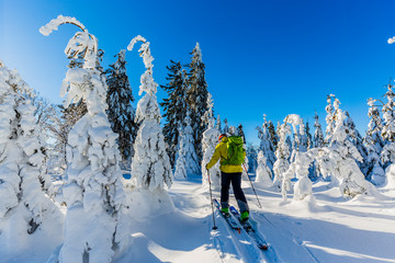 Ski in Beskidy mountains. The skituring man, backcountry skiing in fresh powder snow.