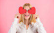 Girl cheerful fall in love. Girl hold heart symbol love and romantic pink background. Love is blind. Valentines day has traditionally been seen as more significant for women. Woman celebrate love