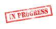 © mawardibahar - Old scratches grunge stamp with red text 'IN PROGRESS'.