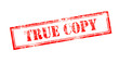 © mawardibahar - Old scratches grunge stamp with red text 'TRUE COPY'.