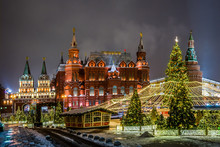 Winter Night View Of The Big Christmas Tree And Decoration On The Manezhnaya Square With The State Historical Museum, Iverskaya Chapel And Uglovaya Arsenal'naya Tower Of Kremlin In Moscow, Russia.