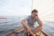 young european man having a nausea seasickness. He is trying to stop vomiting.