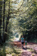 © Przemek Klos - Mother with daughter walking through the forest