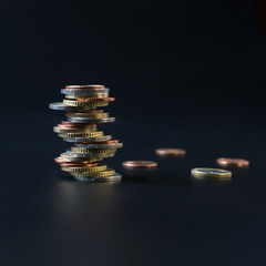 Coins stacked on each other in different positions