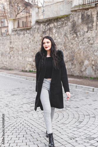 grey jeans black boots