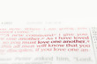 © Kathleen Bowman - Bible text red letters reading love one another with copy space