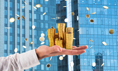 Businessman hold piles of money. Concept of success and company growth