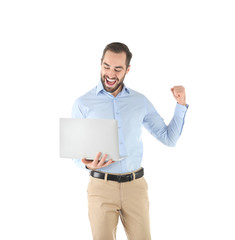 Emotional young man with laptop celebrating victory on white background