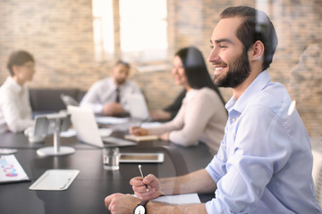 Canvas Print - Young man working in office. Finance trading