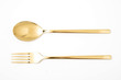 golden spoon and fork isolated on a white