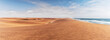 Panoramic Photograph of dunes and ocean on Namibe desert. Africa. Angola.