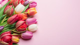 Fototapeta Tulipany - Colorful bouquet of tulips on white background.