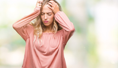 Sticker - Beautiful young blonde woman over isolated background suffering from headache desperate and stressed because pain and migraine. Hands on head.