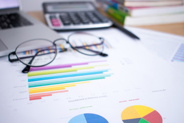 Poster - Picture of financial documents on a wooden table.