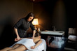 © BGStock72 - Young woman having a massage