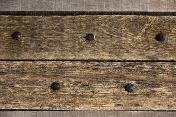 Wood planks texture dark background or wallpaper. overlap wooden wall horizontally have damage of old. Dark brown rustic aged barn wood planks background. Space for text, copy, lettering