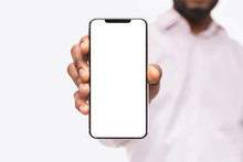 Businessman Showing Smart Phone, With Copy Space