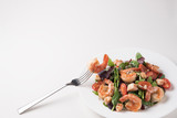 Fototapeta Lawenda - Fresh salad plate with shrimp, tomato and mixed greens. Healthy food. Clean eating.
