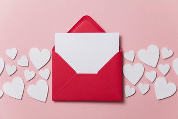 Love letter. white card with red paper envelope mock up