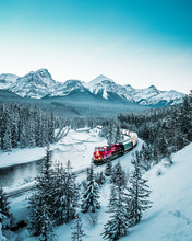 Morant's Curve With Train In Winter, Banff National Park, AB, Canada